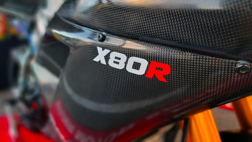 pierobon x80r logo on carbon fiber fairing